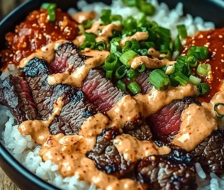 Korean BBQ steak rice bowl with vegetables and rice